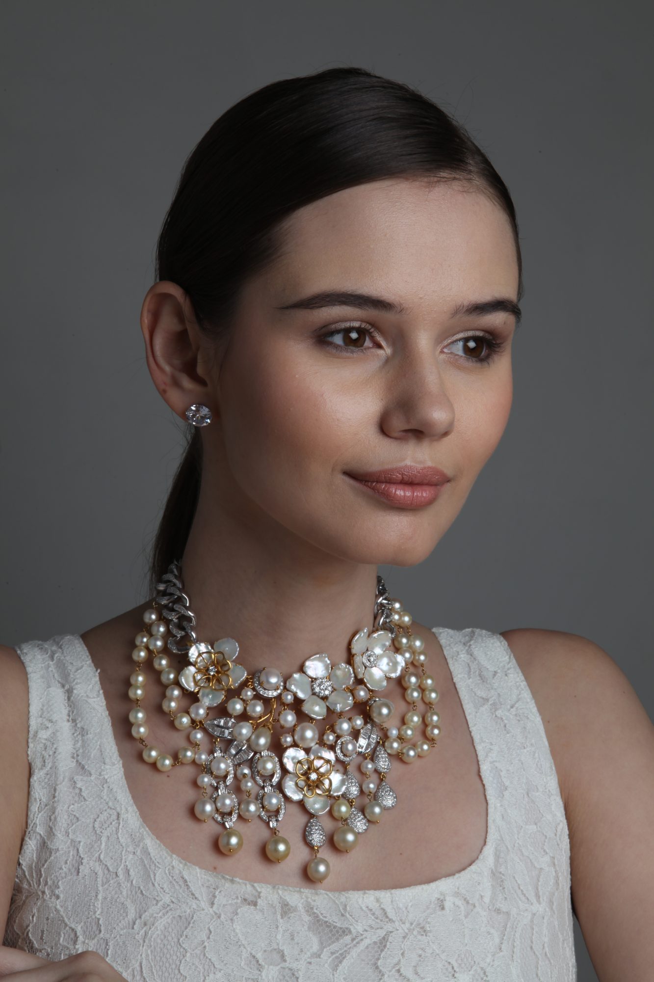 Finished pearl and diamond bib necklace, worn