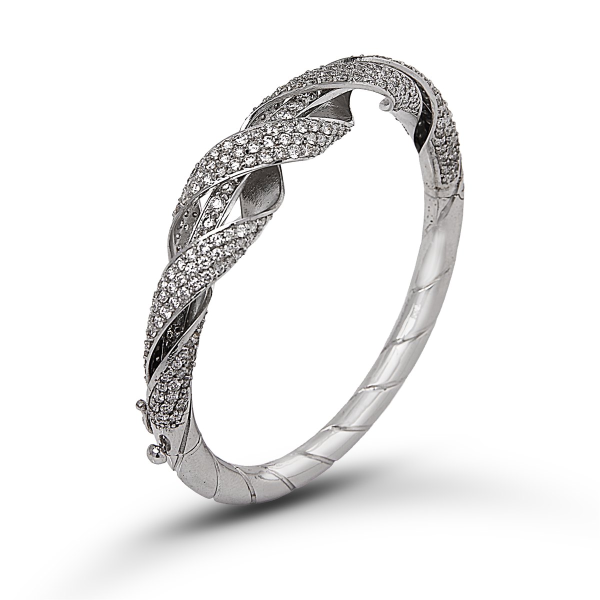 Pavé diamond twist bangle in white gold