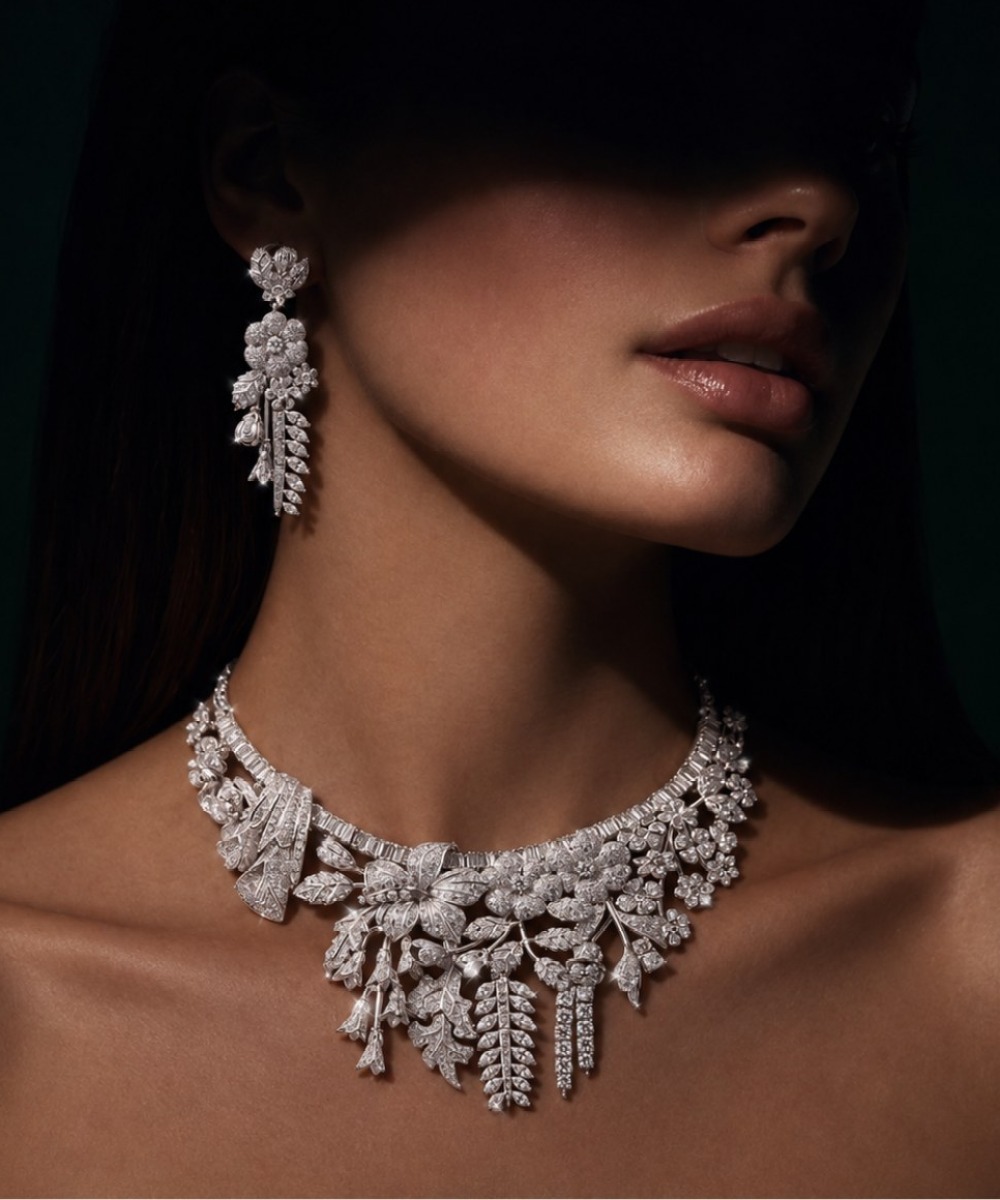 Diamond floral necklace and earrings worn
